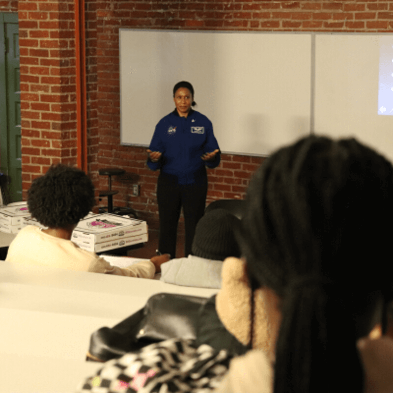 Astronaut Jeanetter Epps talks with stakeholders in the Physics Department