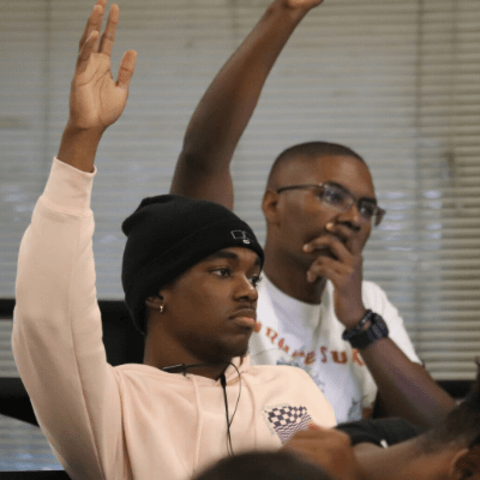 Physics Students Engaging in Class